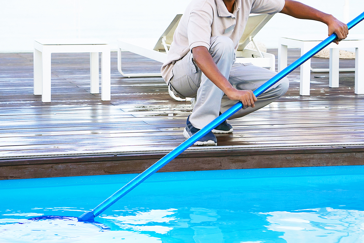 Pool Service Man Clear Debris Image