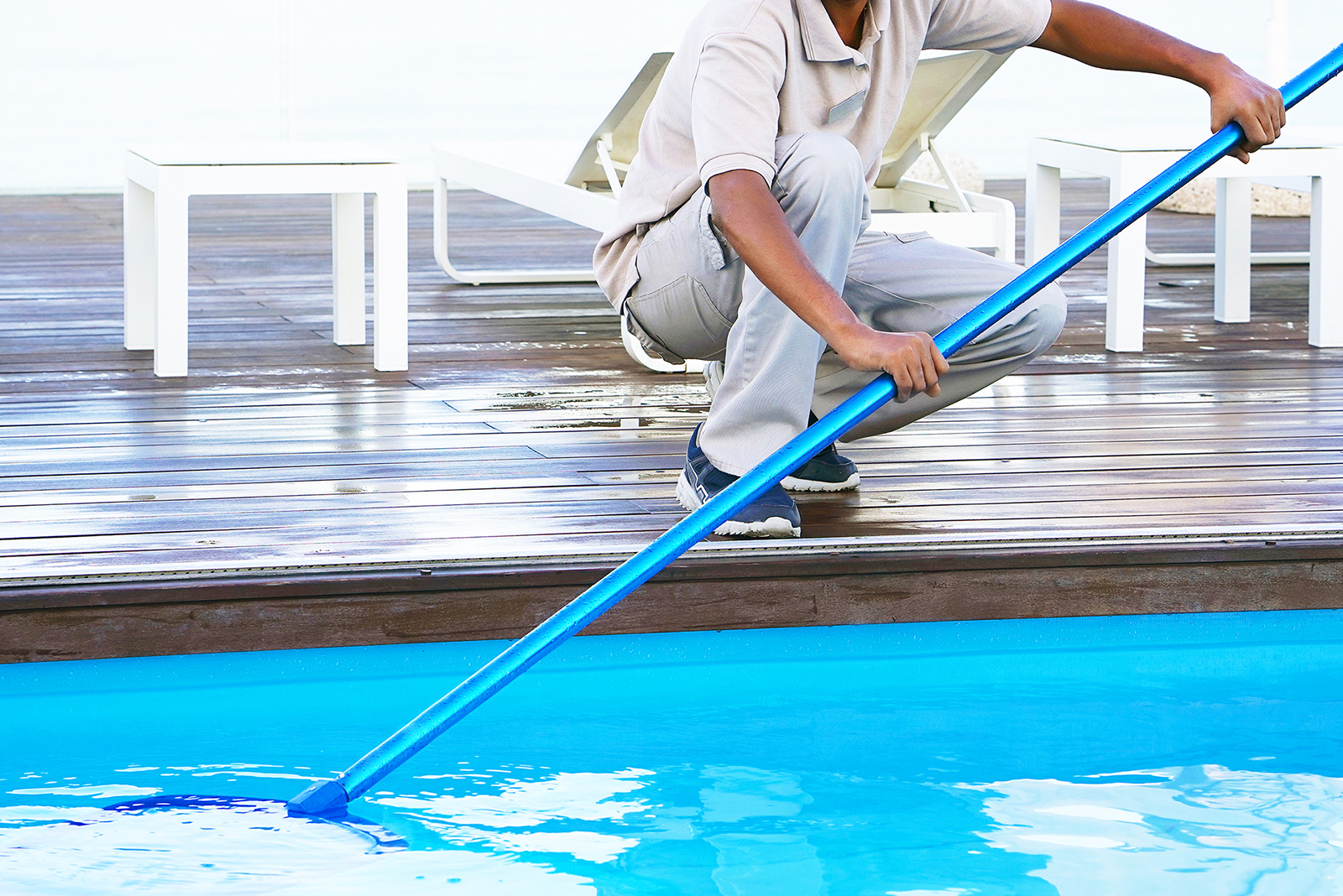 Pool Service Man Clear Debris Image